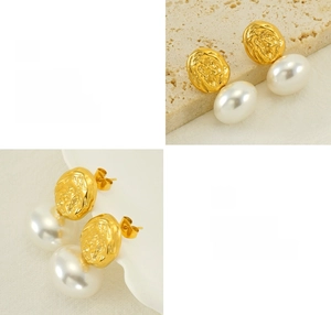 Detail of vintage gold textured metal and white pearl earring with luxury finish
