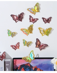 3D hollow butterflies in gold and rose gold colors as creative wall decor