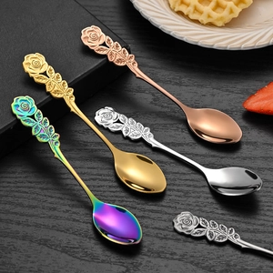 Set of five stainless steel rose flower dessert spoons in assorted metallic colors