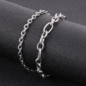 Macro detail of silver double-layer titanium steel chain bracelet with matte and smooth links