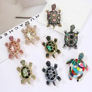 Fashionable tortoise brooches with colorful rhinestones in eight stylish color variants