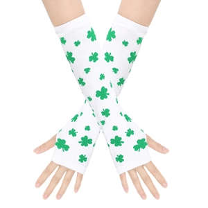 Close-up of white knitted fingerless gloves with green shamrock prints for Saint Patrick Day