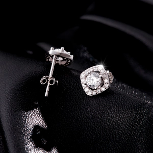 Elegant 925 sterling silver square halo stud earrings with cubic zirconia on black leather