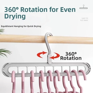Detailed view of grey nine-hole magic clothes hanger with 360-degree rotating hook