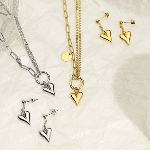 Titanium steel heart jewelry set with double-layered necklaces and matching earrings