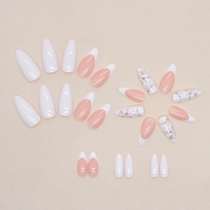 Almond French press-on nails with white marble patterns and messy lines design