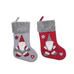 Pair of gray and red felt Christmas stockings with Santa gnome and heart details