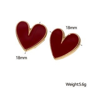 Detailed size view of red heart earrings with gold trim weighing 5.6g and 18mm diameter