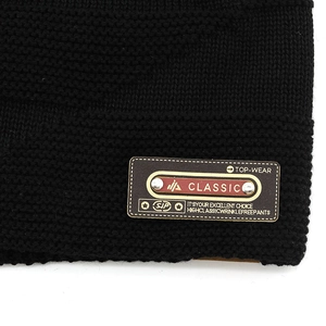 Classic men's black knit beanie with warm fleece lining and retro leather patch detail