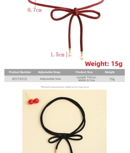 Detail view of 155cm velvet cord belt with pearls for dresses in red and black