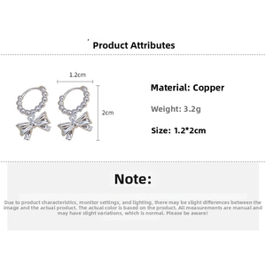 Detailed specs of silver bow earrings with beaded hoop made of copper, 1.2x2cm