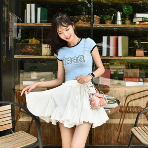Stylish transparent daisy chain bag paired with a casual outfit for a trendy look
