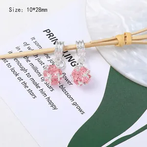 Detailed view of pink crystal ball pendant with silver frame for DIY jewelry making