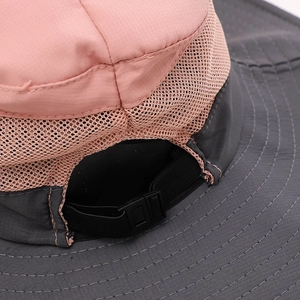 Detail of adjustable elastic drawstring and breathable mesh on pink outdoor sun hat