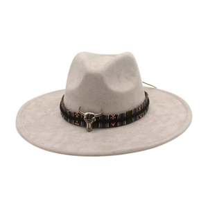 Detail of felt fedora hat featuring ethnic woven band and metallic bull skull ornament