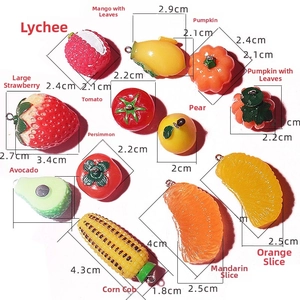 Detailed view of assorted resin fruit and vegetable charms with size specifications