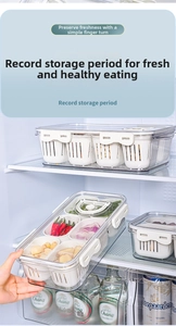 Detailed view of clear storage box with adjustable date dial and inner drain basket