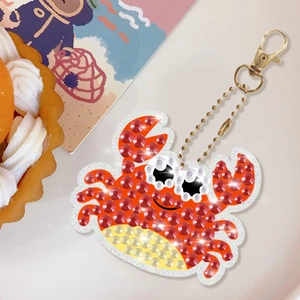 DIY diamond painting crab keychain with sparkling red and yellow resin rhinestones