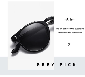 Detail of classic black thick frame polarized sunglasses with metallic hinges and rivets