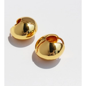 Minimalist gold oval bead earrings with a polished 24k mirror finish in 3D sphere style