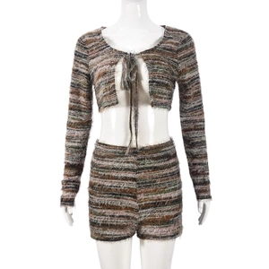 Detail of fuzzy striped knit set with long sleeve tie-front crop top and matching shorts