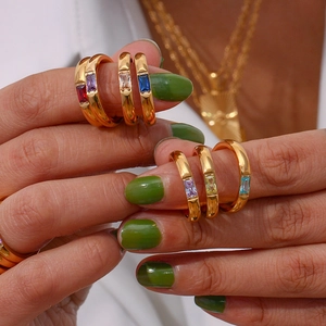Close-up of 18K gold plated stainless steel rings with colorful rectangle zircon stones