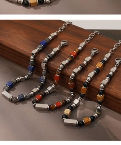 Detail view of natural stone beaded bracelets with stainless steel lobster clasp and chain