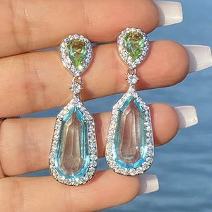 Silver drop earrings with blue and yellow gemstones and micro-pave diamond accents