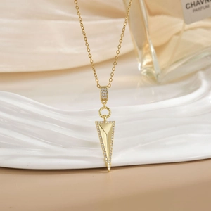 Luxurious gold triangle pendant necklace with pave-set zircon on thin O-shaped chain
