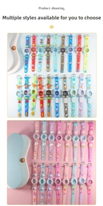 Detail of 3D cartoon silicone strap with astronaut and dinosaur motifs for kids' watches