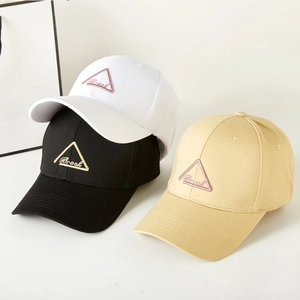 Classic baseball caps in white, black and beige with triangle embroidery and Break text
