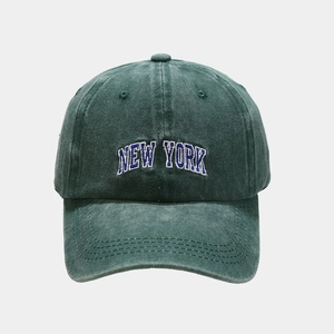 Detail of New York embroidery on washed cotton fabric of this vintage baseball cap