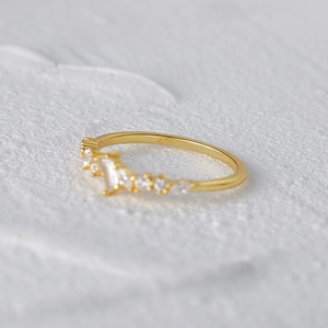 Macro shot of S925 hallmark on gold plated ring band with marquise cubic zirconia