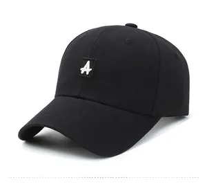 Close-up of black cotton twill baseball cap featuring white letter A embroidery detail