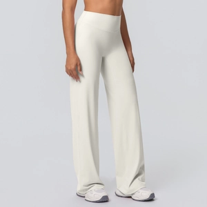 Detail view of off-white high waisted yoga flare pants with soft brushed fabric texture