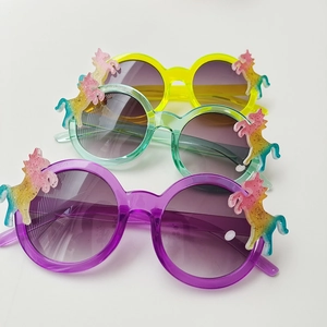 Children's unicorn sunglasses with glitter frames and gradient lenses in multiple colors