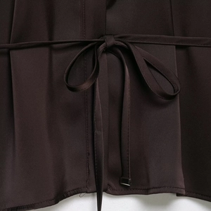 Elegant satin blouse in deep chocolate brown featuring a stylish waist tie with metal accents