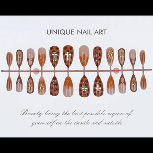 Detail of 24pcs Stiletto nails with leopard print and golden cross 3D nail art design