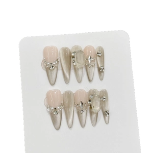 French style stiletto press-on nails with cat eye pearl and rhinestone detailing