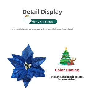 Détail du poinsettia bleu artificiel avec paillettes et pétales en tissu texturé