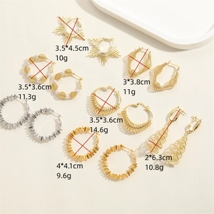 Assorted gold and silver geometric hoop earrings with sizes and weights shown on cream background
