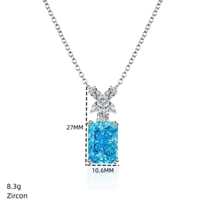 Macro detail of silver necklace with ice flower cut blue zircon pendant and dimensions