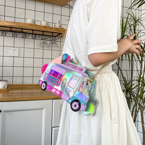 Detail of laser holographic ice cream truck crossbody bag with metal chain and pink pompom