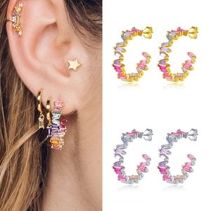 Rainbow C-shaped hoop earrings with colorful zircon stones shown in gold and silver finishes
