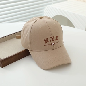 Detail of khaki cotton baseball cap with dark brown N.Y.C 21 embroidery for kids