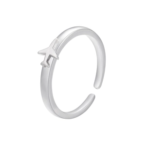 Detail of silver-plated open ring featuring a 3D airplane design on a polished band