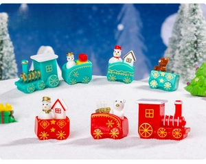 Miniature Christmas train set with snowmen and bears for holiday micro landscape decor