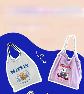 Close-up of cute puppy embroidery on durable nylon tote bag with drawstring straps