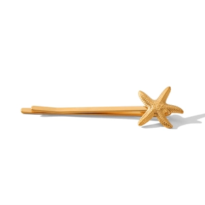 Barrette étoile de mer dorée minimaliste en acier inoxydable sur fond blanc pur
