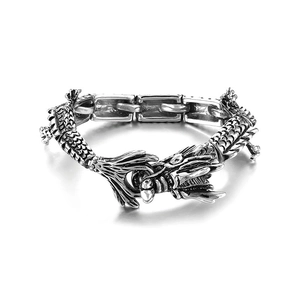 Bracciale punk in acciaio al titanio con testa di drago e finitura argento antico